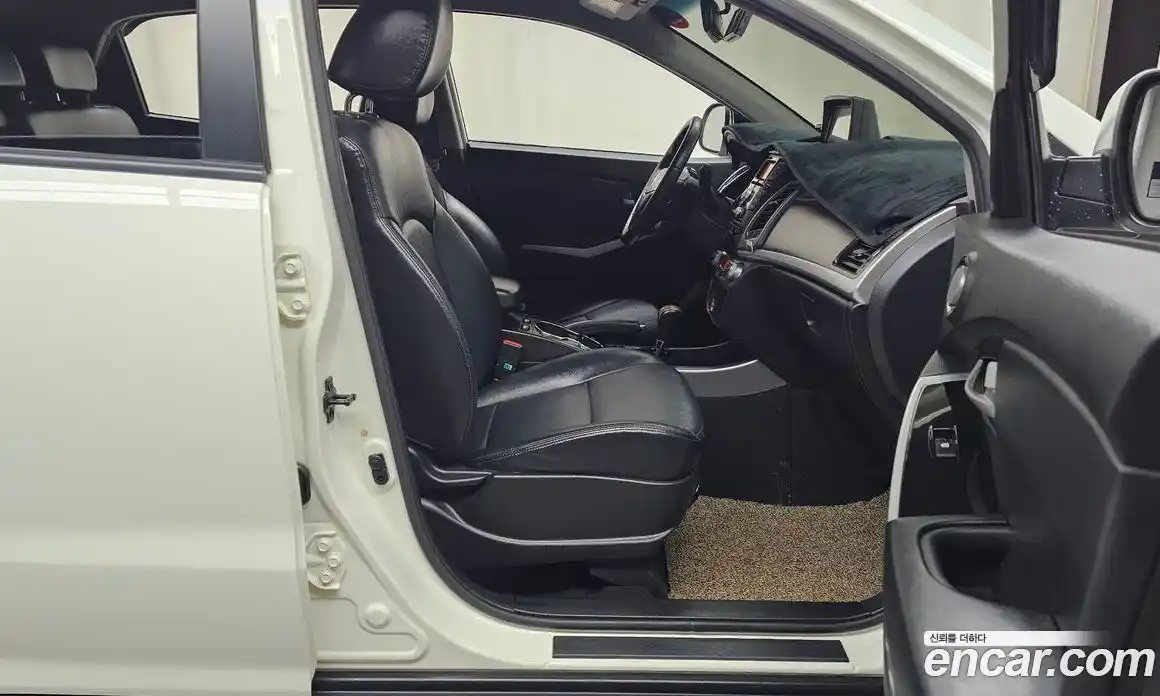SsangYong Korando 2013 2.0 автомат (гидро), фото 11