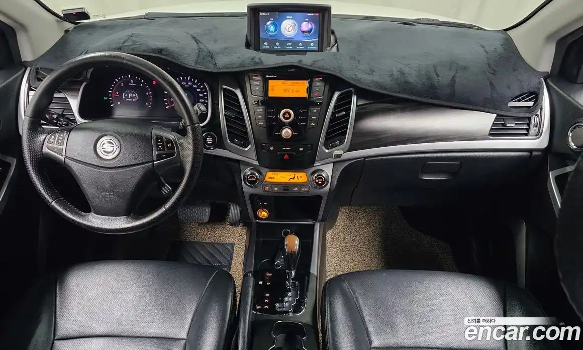 SsangYong Korando 2013 2.0 автомат (гидро), фото 7