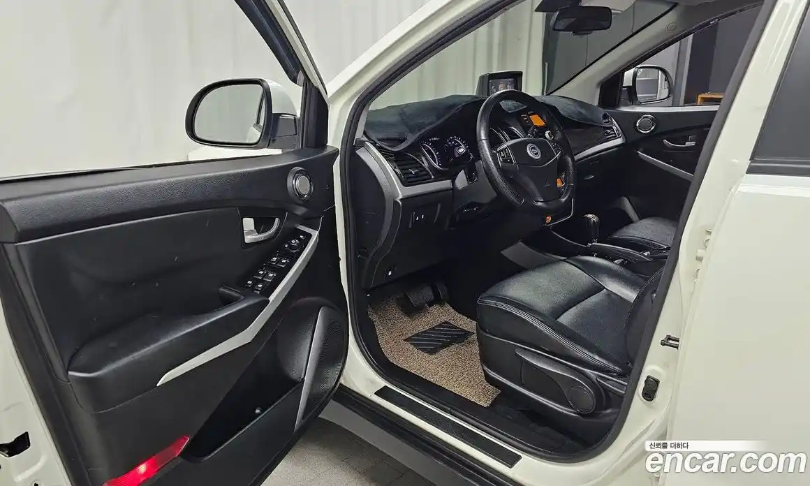 SsangYong Korando 2013 2.0 автомат (гидро), фото 10