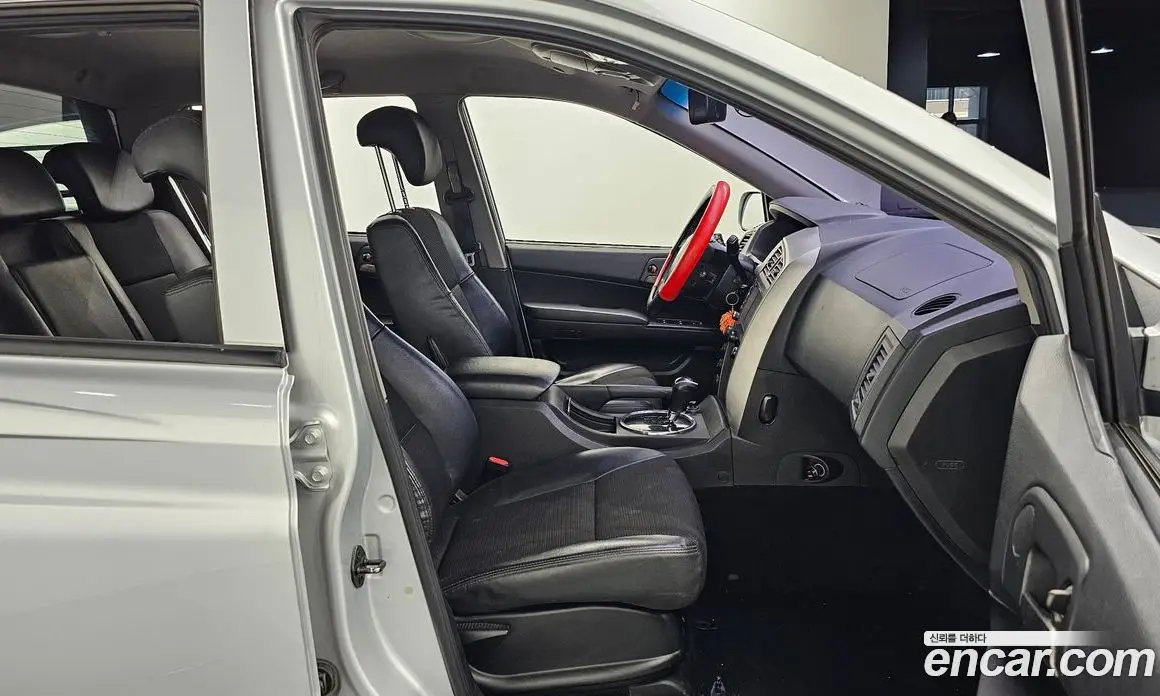 SsangYong Korando 2013 2.0 автомат (гидро), фото 11