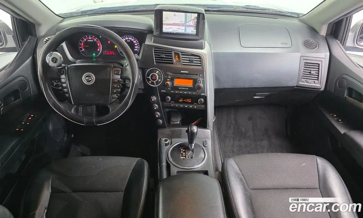 SsangYong Korando 2012 2.0 автомат (гидро), фото 7