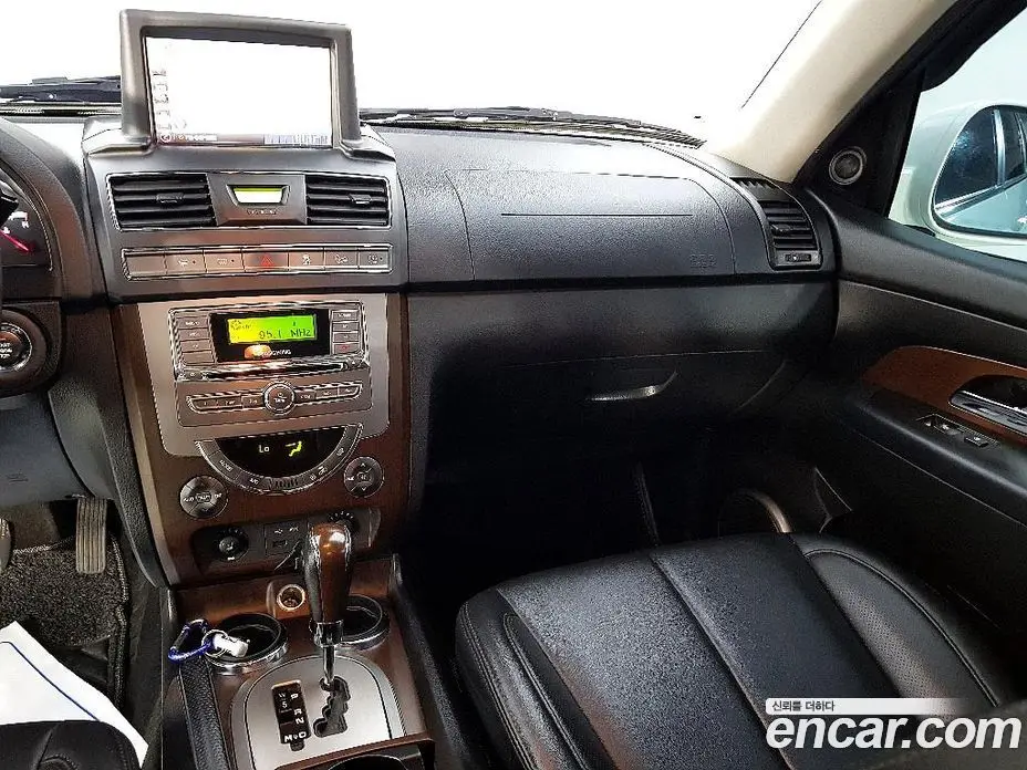 SsangYong Rexton 2012 2.0 автомат (гидро), фото 10