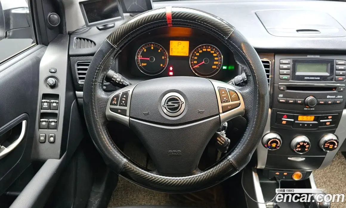 SsangYong Korando 2012 2.0 автомат (гидро), фото 12