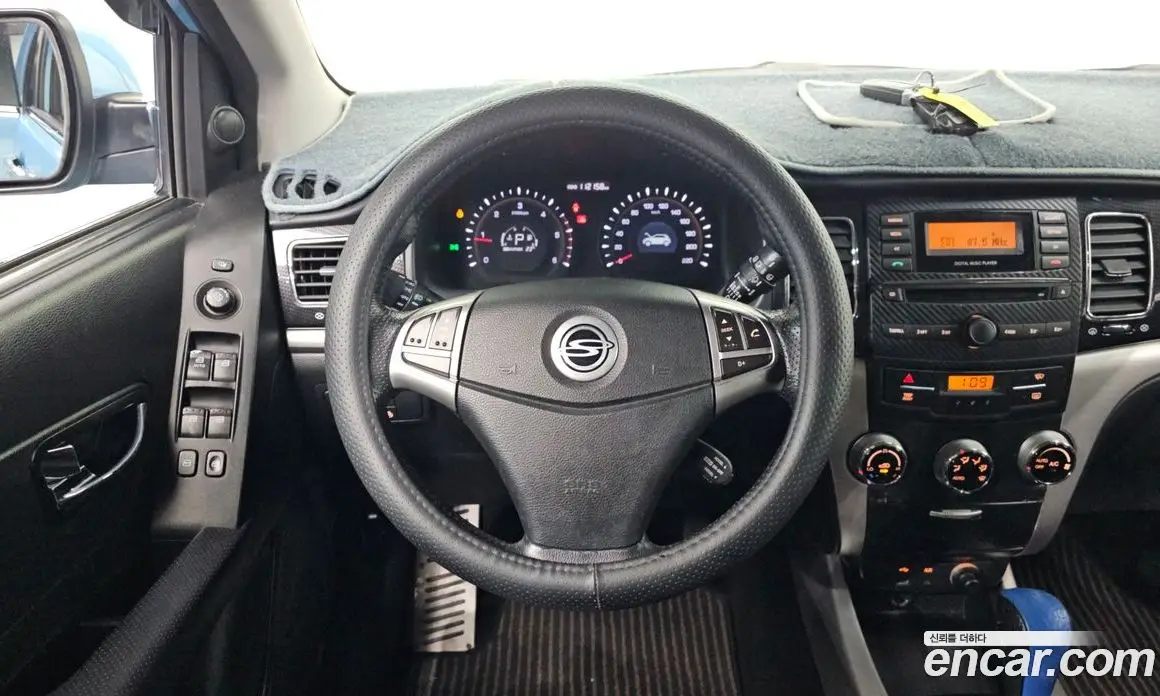 SsangYong Korando 2012 2.0 автомат (гидро), фото 18