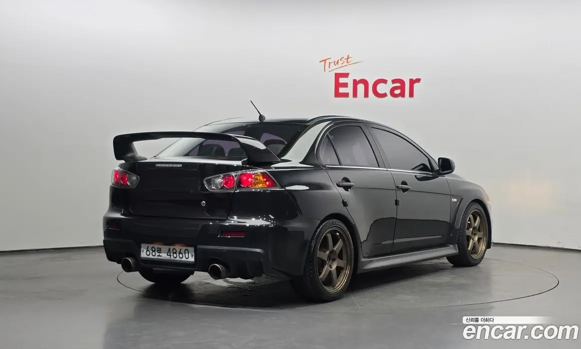 Mitsubishi Lancer Evolution 2010 2.0 автомат (гидро), фото 2 Mitsubishi Lancer Evolution 2010 2.0 автомат (гидро), фото 2