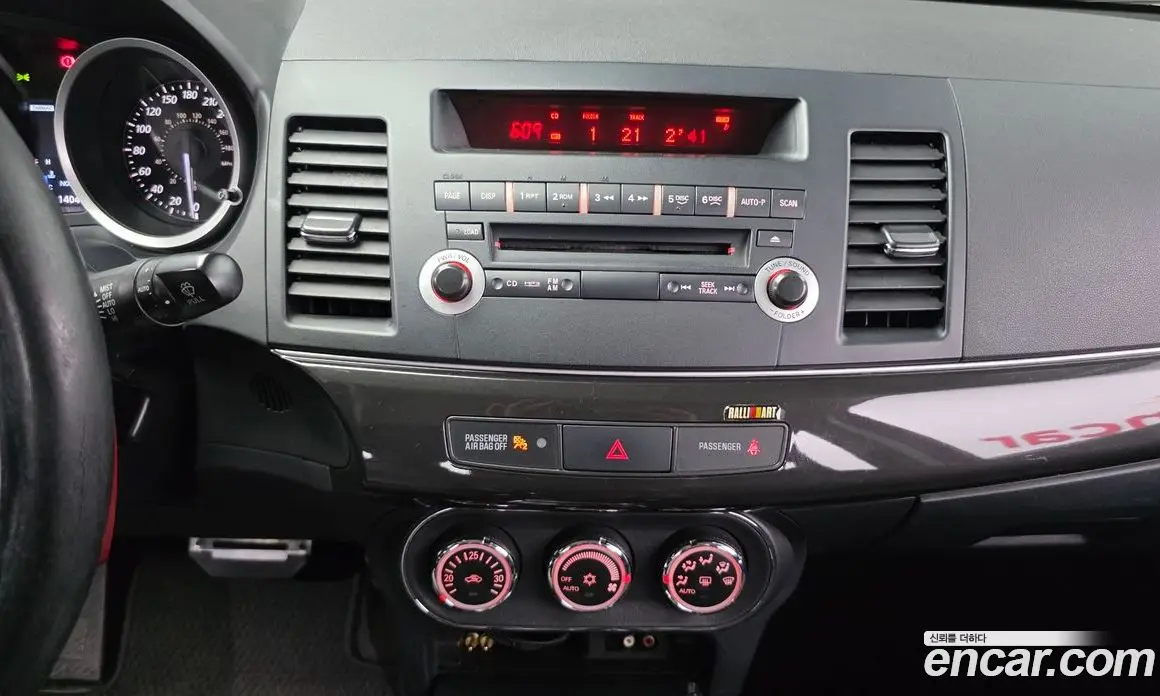 Mitsubishi Lancer Evolution 2010 2.0 автомат (гидро), фото 18 Mitsubishi Lancer Evolution 2010 2.0 автомат (гидро), фото 18