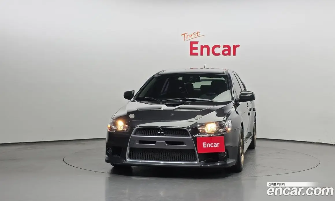 Mitsubishi Lancer Evolution 2010 2.0 автомат (гидро), фото 3 Mitsubishi Lancer Evolution 2010 2.0 автомат (гидро), фото 3