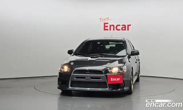 Mitsubishi Lancer Evolution 2010 2.0 автомат (гидро), миниатюра 3 Mitsubishi Lancer Evolution 2010 2.0 автомат (гидро), миниатюра 3