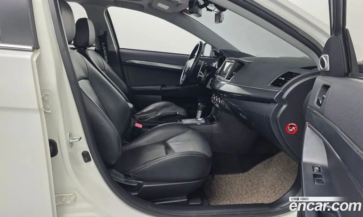 Mitsubishi Lancer 2010 2.0 автомат (гидро), фото 11 Mitsubishi Lancer 2010 2.0 автомат (гидро), фото 11