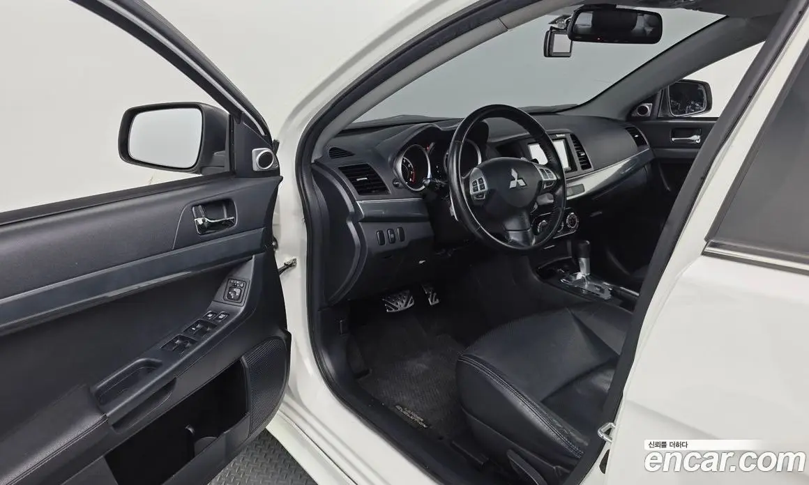 Mitsubishi Lancer 2010 2.0 автомат (гидро), фото 10 Mitsubishi Lancer 2010 2.0 автомат (гидро), фото 10