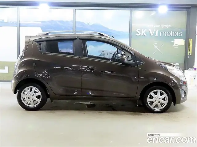Chevrolet Spark 2012 1.0 автомат (гидро), миниатюра 7
