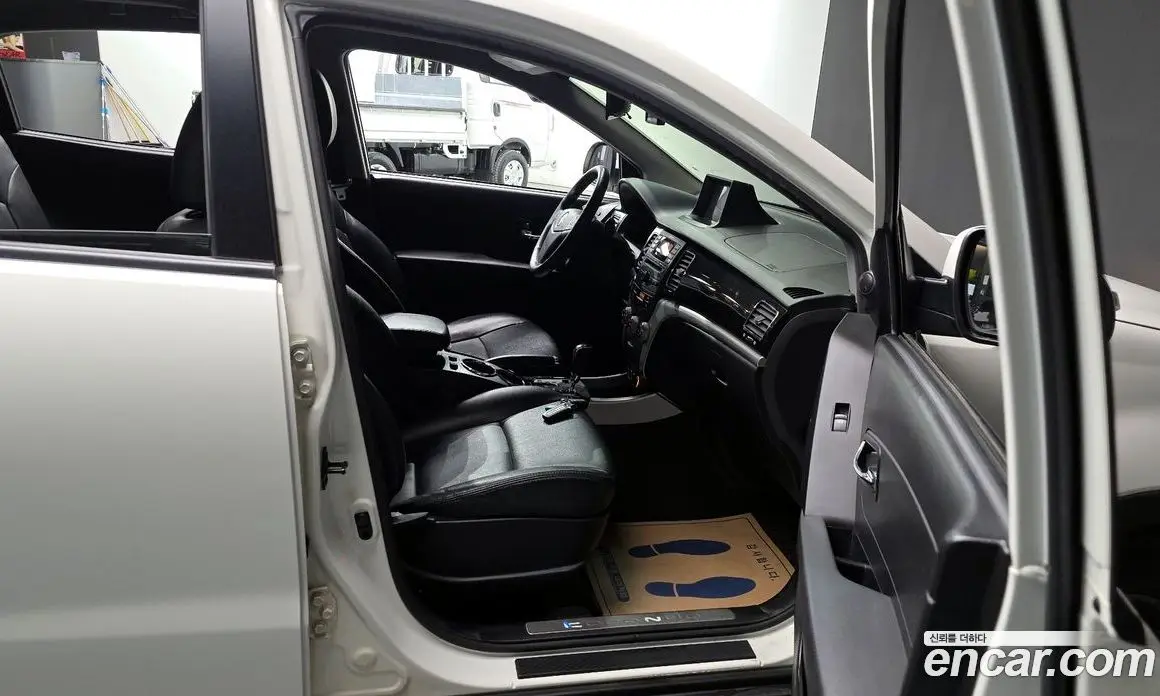 SsangYong Korando 2012 2.0 автомат (гидро), фото 11