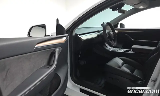 Tesla Model Y 2023 0.2 автомат (гидро), миниатюра 12
