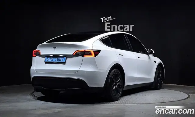 Tesla Model Y 2024 0.2 автомат (гидро), миниатюра 2