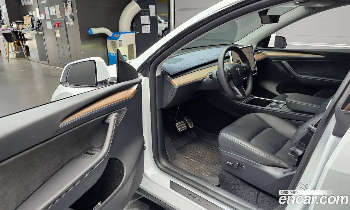 Tesla Model Y 2024 0.2 автомат (гидро), фото 13
