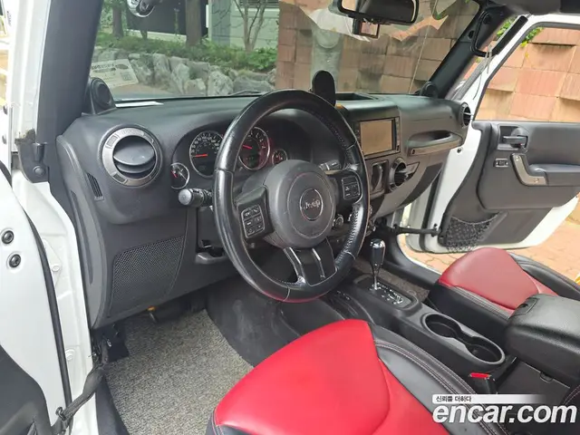 Jeep Wrangler 2014 3.6 автомат (гидро), миниатюра 10
