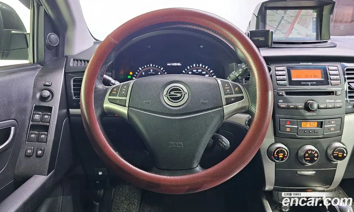 SsangYong Korando 2013 2.0 автомат (гидро), фото 13