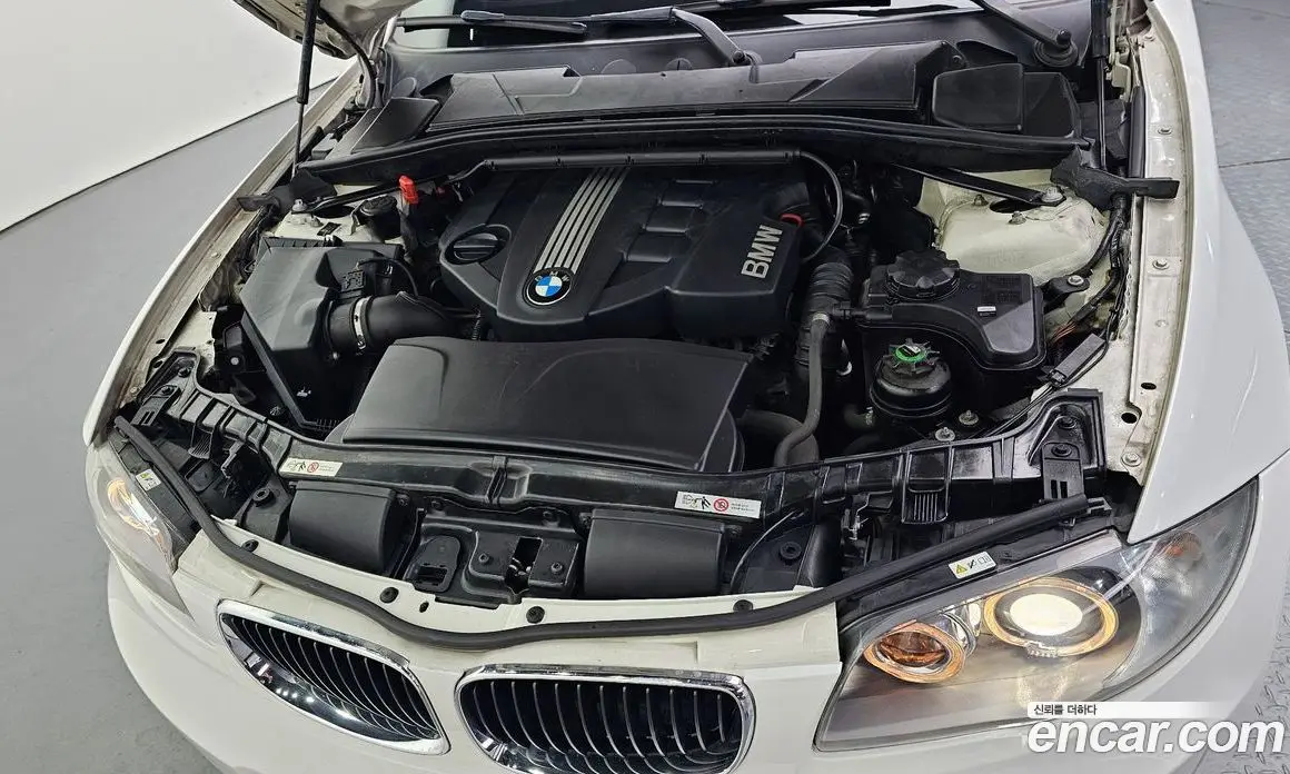 BMW 1 серия 2010 2.0 автомат (гидро), фото 6