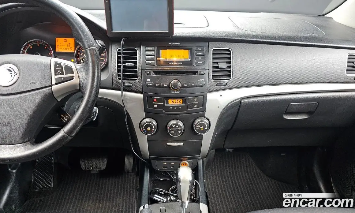 SsangYong Korando 2011 2.0 автомат (гидро), фото 16