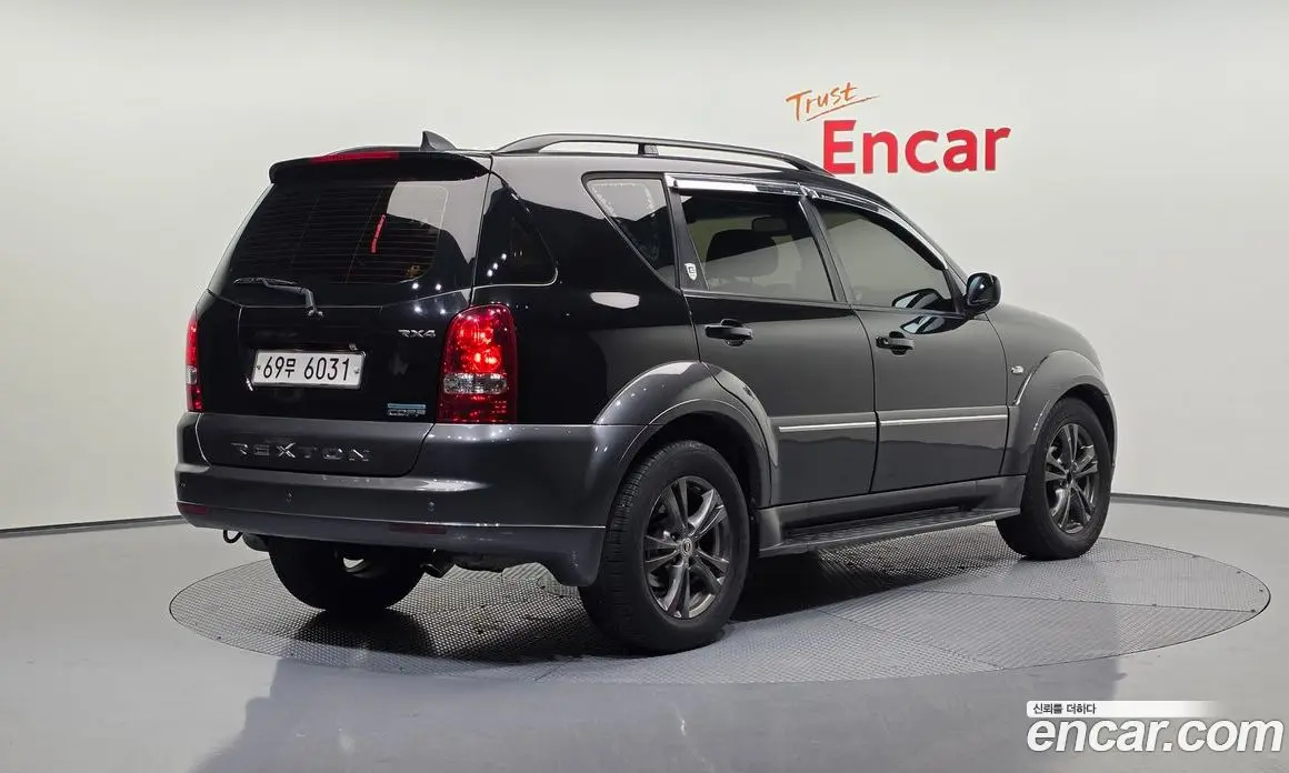 SsangYong Rexton 2011 2.0 автомат (гидро), фото 2