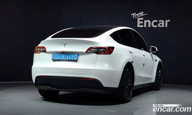 Tesla Model Y 2024 0.2 автомат (гидро), миниатюра 2