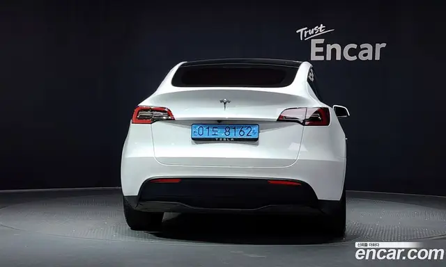 Tesla Model Y 2024 0.2 автомат (гидро), миниатюра 4