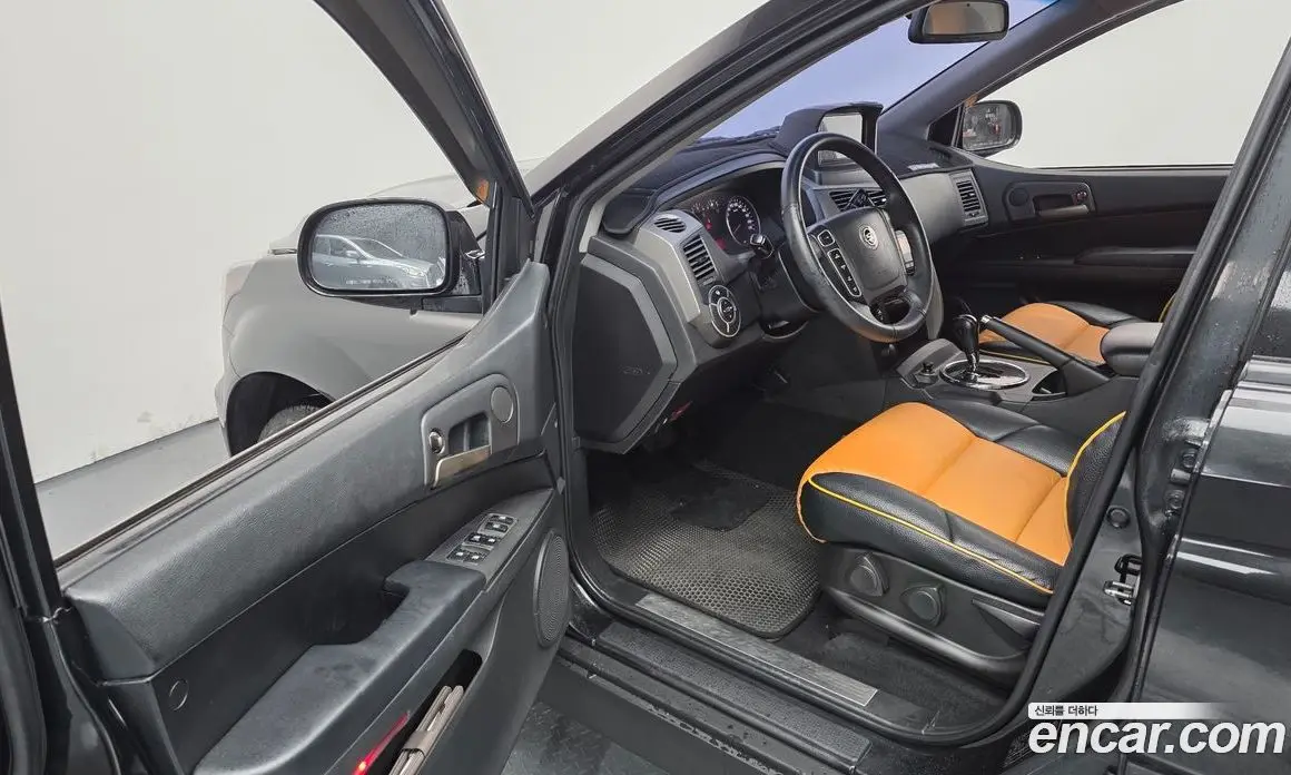 SsangYong Korando 2013 2.0 автомат (гидро), фото 11