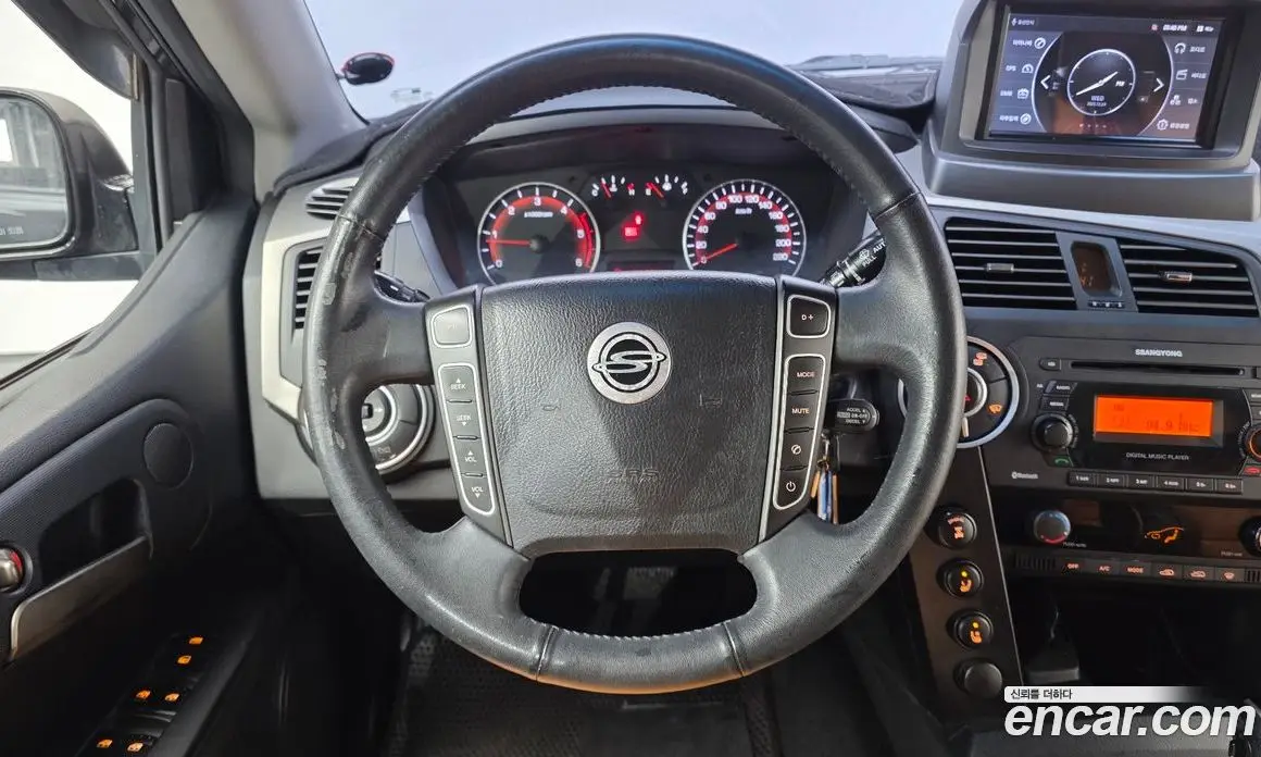 SsangYong Korando 2013 2.0 автомат (гидро), фото 12