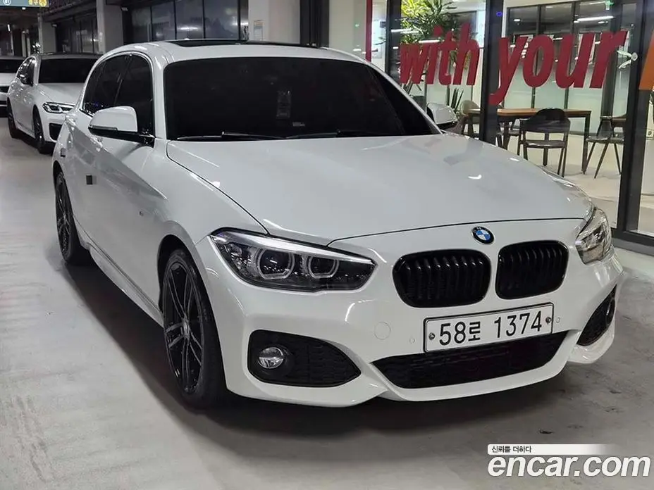 BMW 1 серия 2018 2.0 автомат (гидро), фото 1