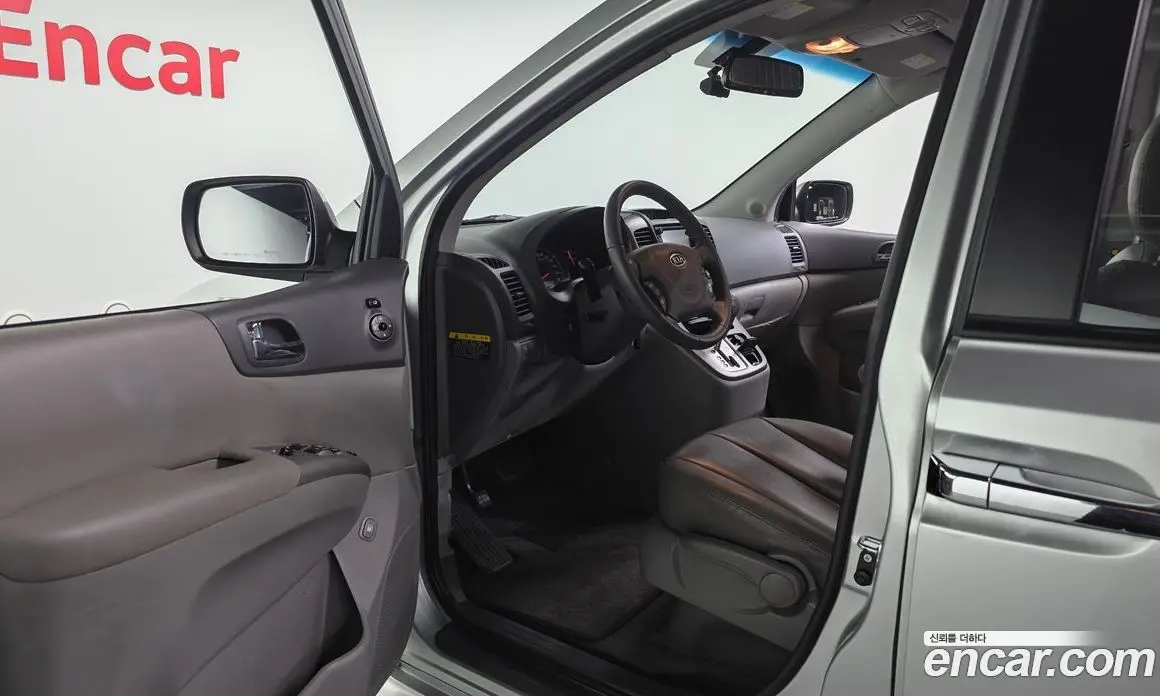 Kia Carnival 2011 2.2 автомат (гидро), фото 10 Kia Carnival 2011 2.2 автомат (гидро), фото 10