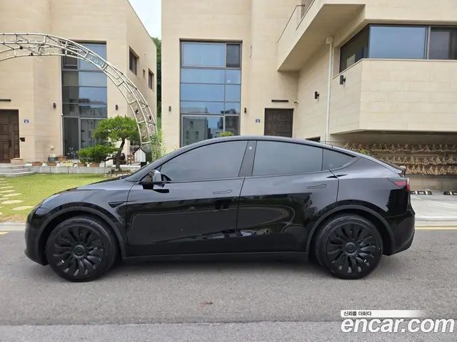 Tesla Model Y 2023 автомат (гидро), миниатюра 5