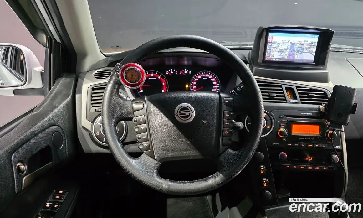 SsangYong Korando 2012 2.0 автомат (гидро), фото 13