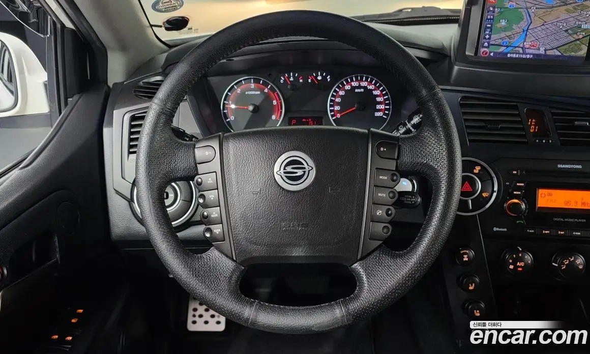 SsangYong Korando 2012 2.0 автомат (гидро), фото 13
