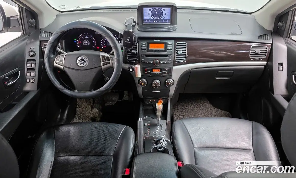 SsangYong Korando 2011 2.0 автомат (гидро), фото 7