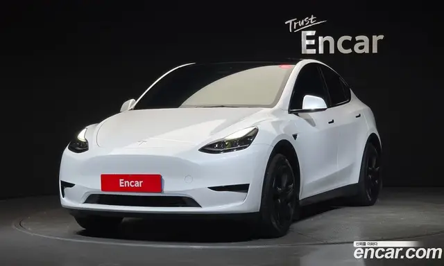 Tesla Model Y 2023 0.2 автомат (гидро), миниатюра 1