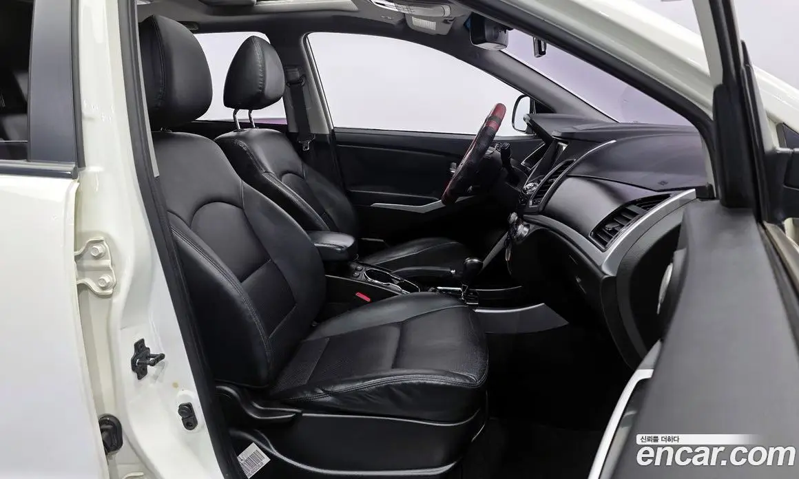 SsangYong Korando 2014 2.0 автомат (гидро), фото 11