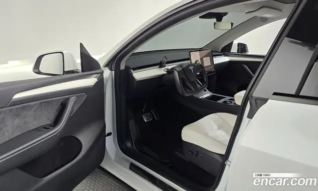 Tesla Model Y 2024 0.2 автомат (гидро), миниатюра 12
