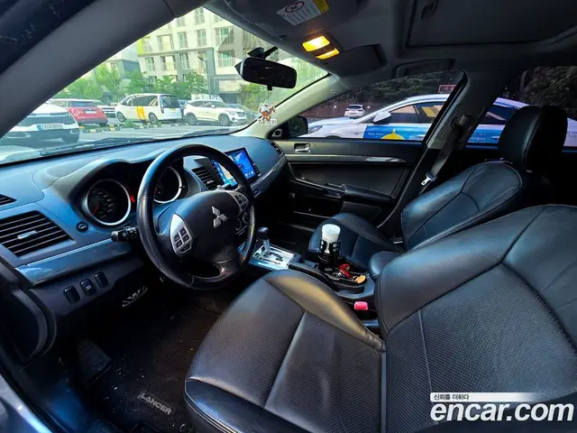 Mitsubishi Lancer 2009 2.0 автомат (гидро), миниатюра 7 Mitsubishi Lancer 2009 2.0 автомат (гидро), миниатюра 7