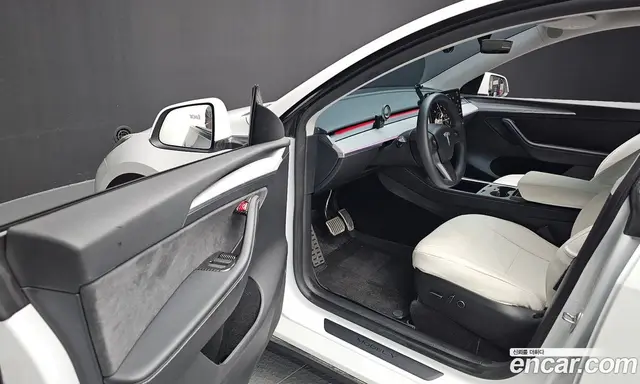 Tesla Model Y 2024 0.2 автомат (гидро), миниатюра 12