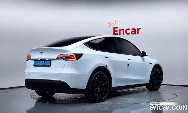 Tesla Model Y 2024 0.2 автомат (гидро), миниатюра 2