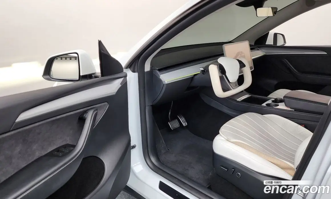 Tesla Model Y 2024 0.2 автомат (гидро), фото 13