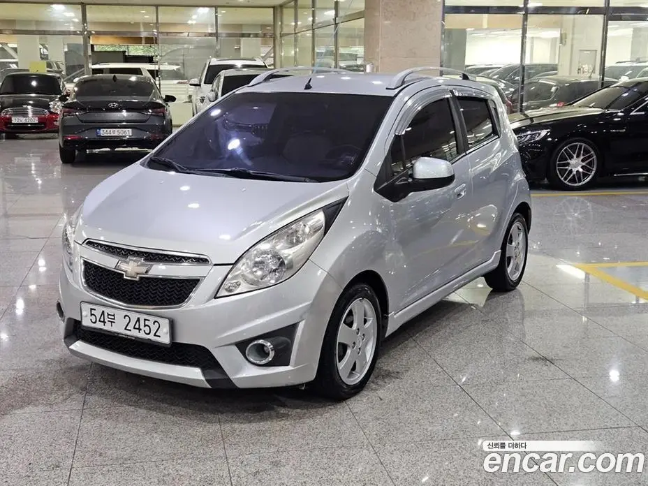 Chevrolet Spark 2011 1.0 автомат (вариатор), фото 1 Chevrolet Spark 2011 1.0 автомат (вариатор), фото 1