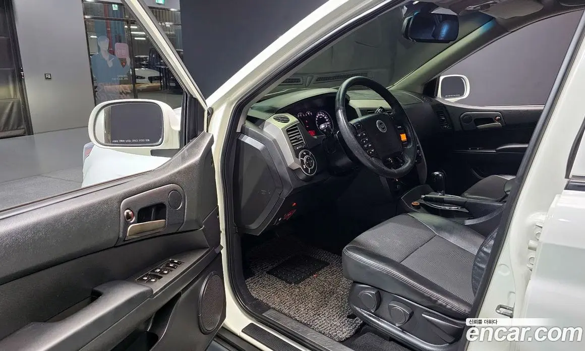 SsangYong Korando 2012 2.0 автомат (гидро), фото 11