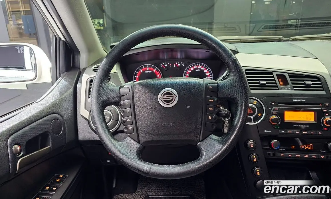SsangYong Korando 2012 2.0 автомат (гидро), фото 13