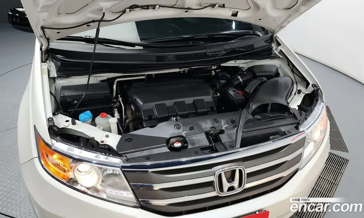 Honda Odyssey 2013 3.5 автомат (гидро), фото 6 Honda Odyssey 2013 3.5 автомат (гидро), фото 6