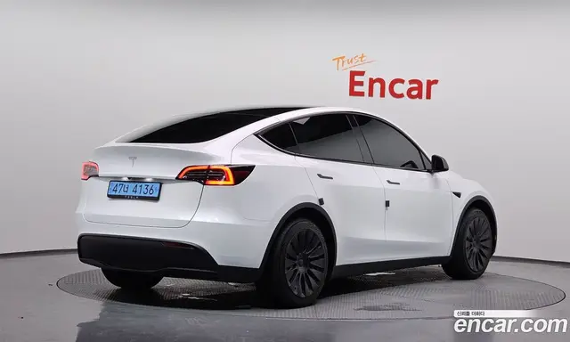 Tesla Model Y 2023 0.2 автомат (гидро), миниатюра 2