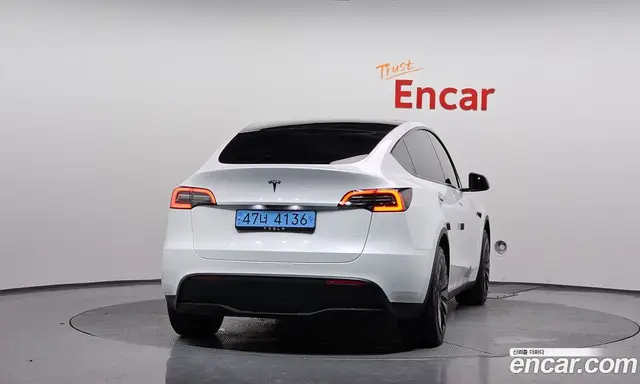 Tesla Model Y 2023 0.2 автомат (гидро), миниатюра 4
