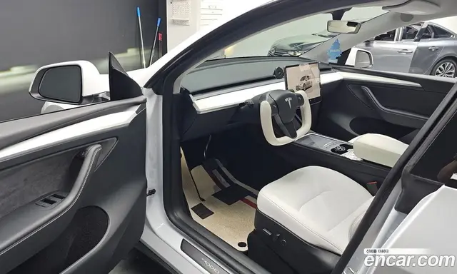 Tesla Model Y 2024 0.2 автомат (гидро), миниатюра 12