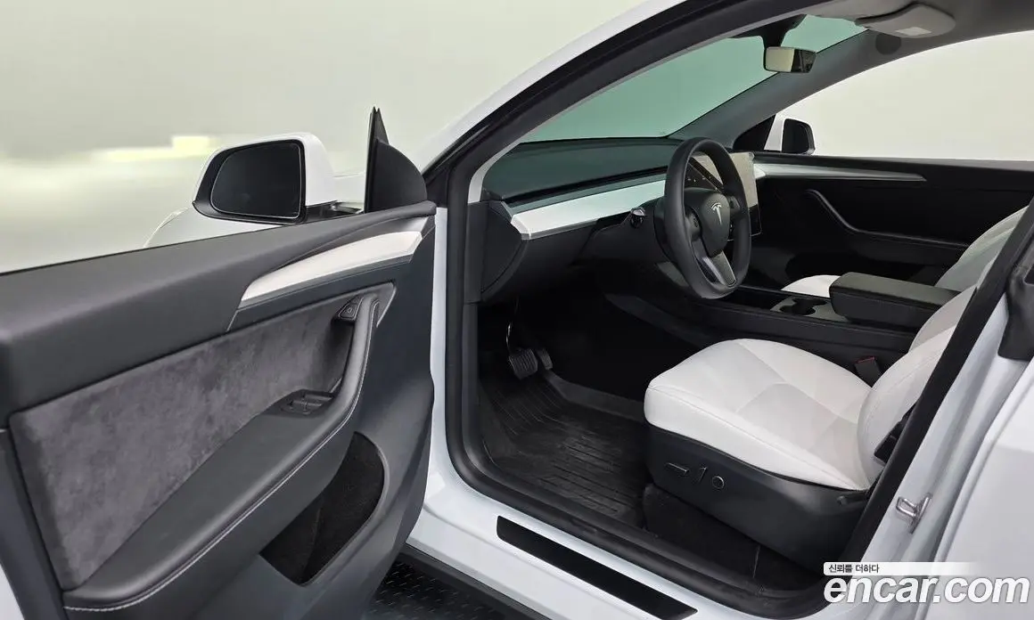 Tesla Model Y 2024 0.2 автомат (гидро), фото 13