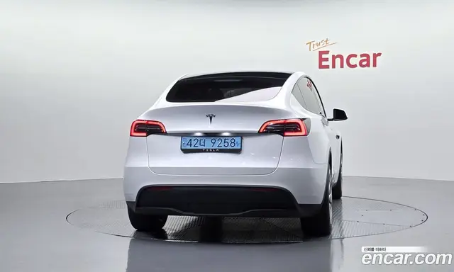 Tesla Model Y 2024 0.2 автомат (гидро), миниатюра 4